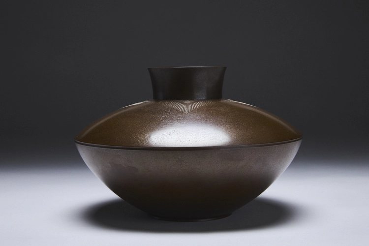 Flatted round bronze vase with fine silver inlay 