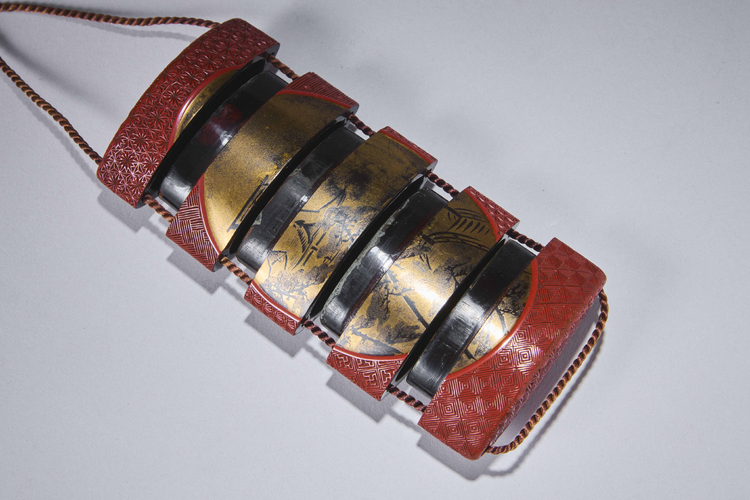 Four-Case Inro with Landscape and Wisteria Medallions
