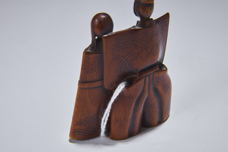Boxwood Netsuke of a pair of Tatebina dolls