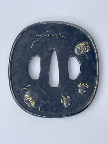 Iron Tsuba with symbols of the Shichifukujin