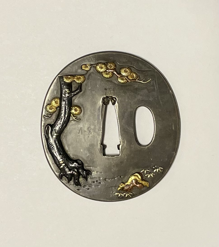 Mixed Metal Tsuba with a Mongolian Archer and his Dog