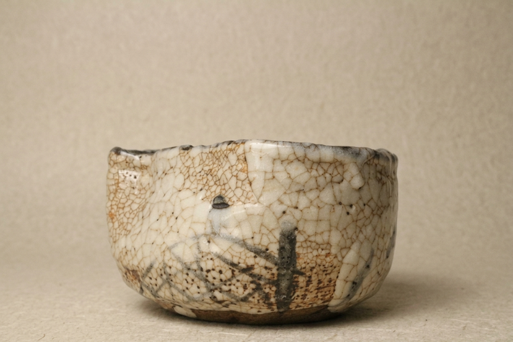 Ko-Shino teabowl decorated with plovers and grasses