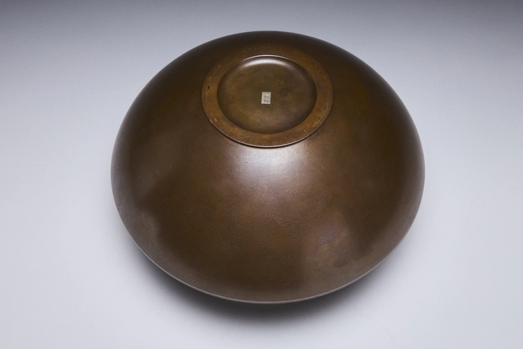 Flatted round bronze vase with fine silver inlay 
